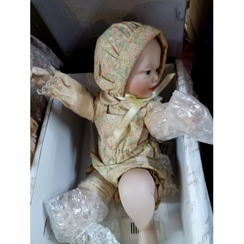 1022 - An Ashton Drake Galleries Porcelain Doll - Boxed plus 5 x Others