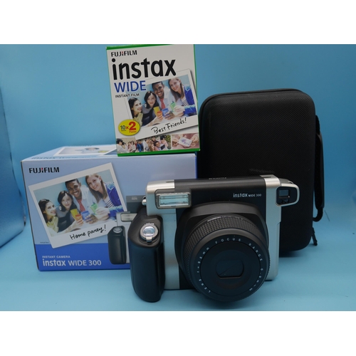 706 - An Instax Wide 300 Fuji Film Instant Camera With Case