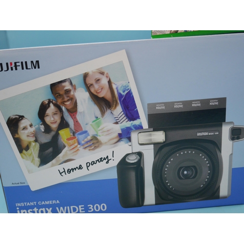 707 - An Instax Wide 300 Fuji Film Instant Camera With Case & Films. Boxed & Unopened.