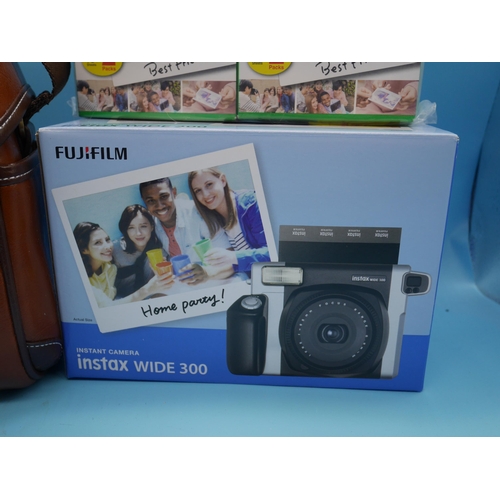 708 - An Instax Wide 300 Fuji Film Instant Camera With Case & Films. Boxed & Unopened.