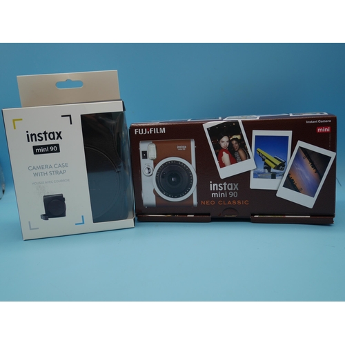 711 - An Instax Mini 90 Neo Classic Camera & Case - Boxed & Unopened.