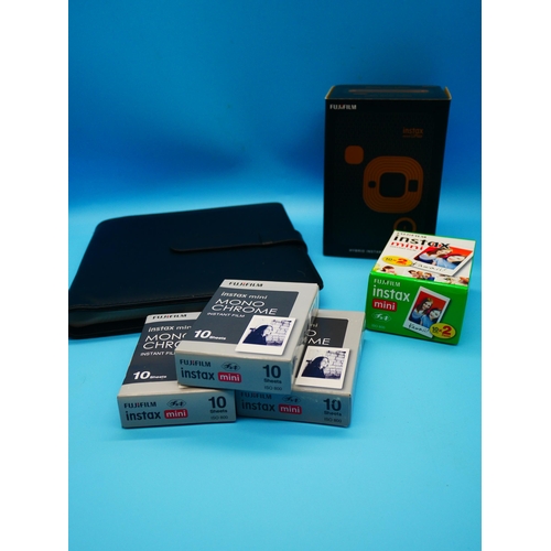 712 - An Instax Mini L, Play 2- in 1 Hybrid Instant Photo Camera & Film & Album. Boxed & Unopened.