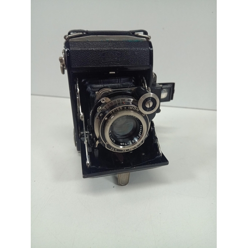 738 - A Zeiss Ikon Compur Bellows Camera and Leather case