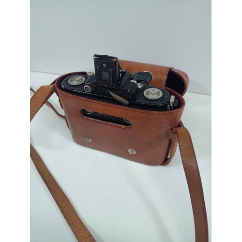 738 - A Zeiss Ikon Compur Bellows Camera and Leather case