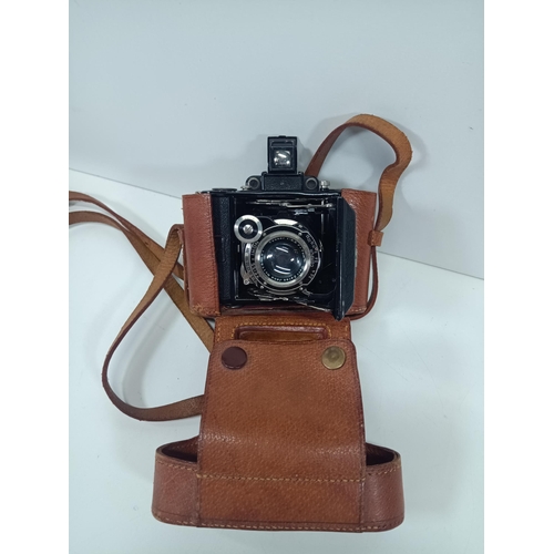 738 - A Zeiss Ikon Compur Bellows Camera and Leather case