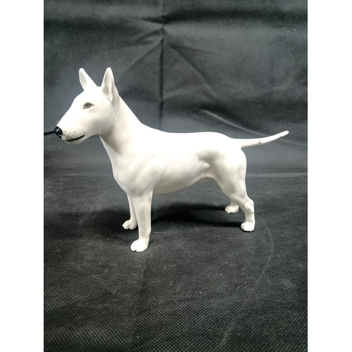 865 - A Beswick Staffordshire Bull Terrier - Repair to Tail