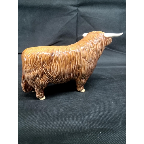 876 - A Beswick Highland Cattle Ornament (repair to Horn)