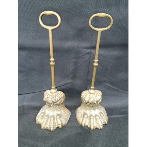 1011 - Two Brass Lions Feet Doorstops