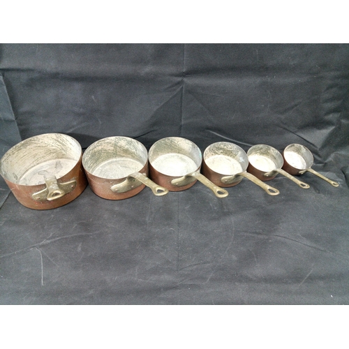 1012 - A Set of 5 x Copper and Brass Graduated Saucepans