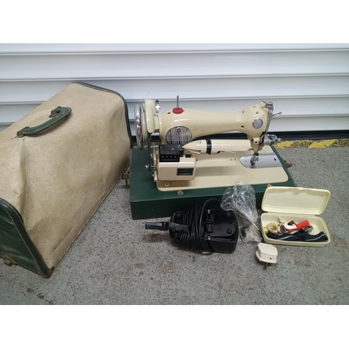 313 - Sew - Tric Electric Sewing Machine With Foot Pedal. Original Oil Can & Some Accessories. In Damaged ... 