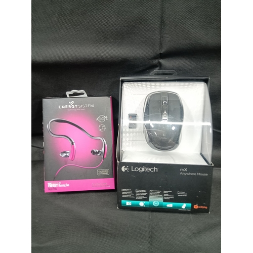 814 - A Logitech MX Anywhere Mouse and Energy Running Two Neon Pink Headphones