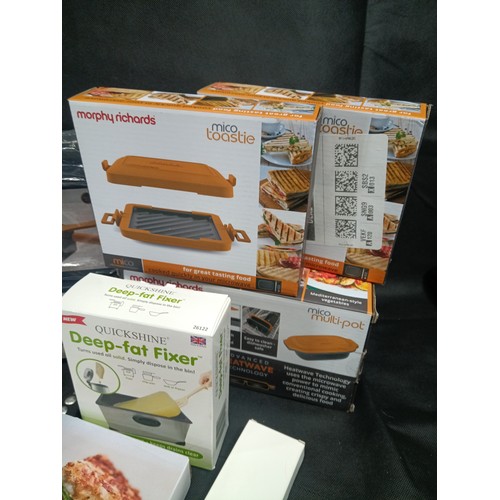 833 - A Quantity of Boxed and Unused Cookware inc. Morphy Richards Micro Toasters, Micro Multipot, Mini Ra... 