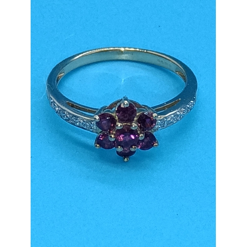 464 - A 9ct Yellow Gold Amethyst Daisy Ring with Diamond Shoulders 2 Grams , Size N/O