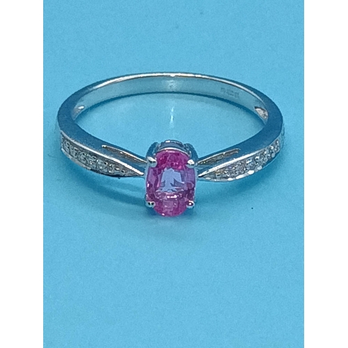 421 - A 9ct Carat  White Gold Ring with an Oval Cut Pink Tourmaline and Diamond Accents Size N/O,  1.94 gr... 