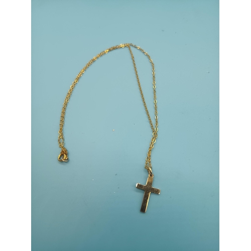 462 - A 9ct Gold Crucifix on a 9ct Gold Chain