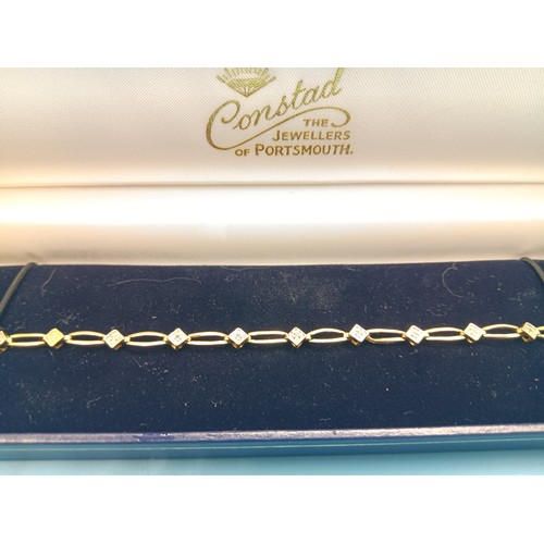 470 - A 9ct Diamond and Yellow Gold Bracelet