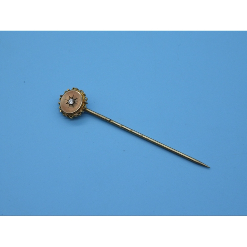 479 - A 9ct Gold & Diamond Stick Pin.