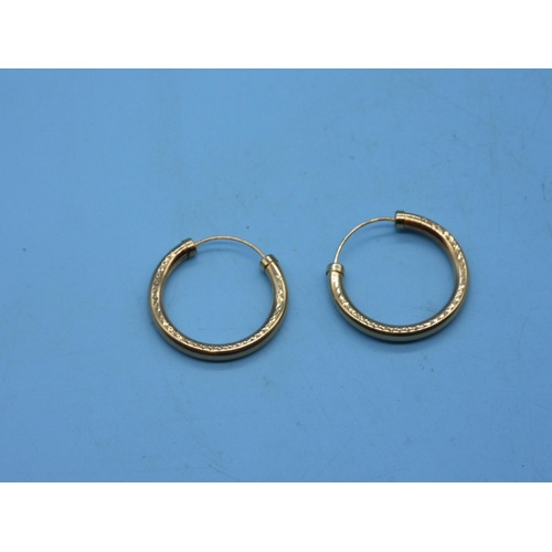 475 - A Pair Of 9ct Gold Hoop Earrings.