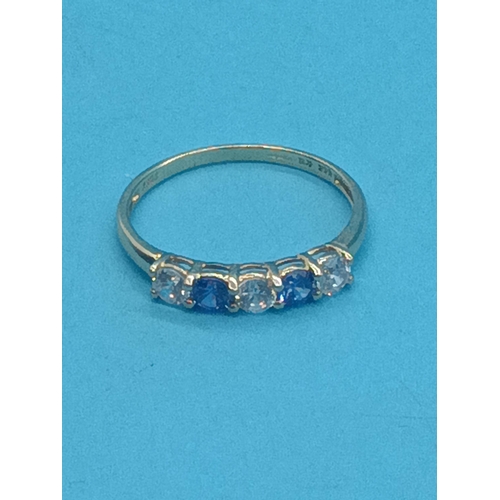 419 - A White and Blue Stone Half Eternity Ring Size T - 2 Grams