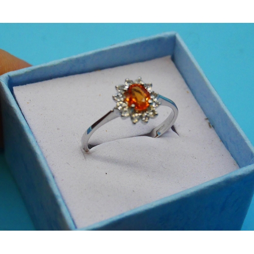 405 - A 9ct White Gold and Orange Topaz Ring Size N 1.86 Gms