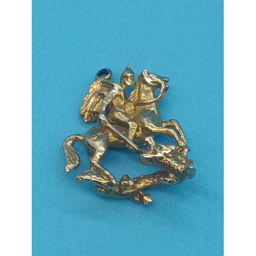 435 - A 9ct Gold Charm  - St George and the Dragon - 4.37 grams