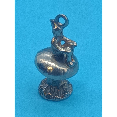 445 - A 9ct Gold Charm  - Pixie on a Toadstool - 2.4 grams