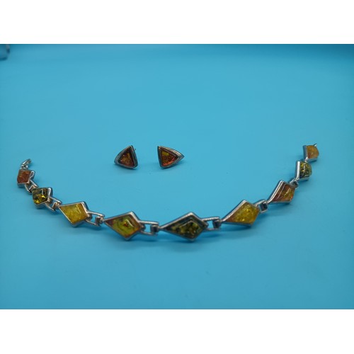 601 - A Multicoloured Amber Necklace and Earrings set in .925 Hallmarked Silver