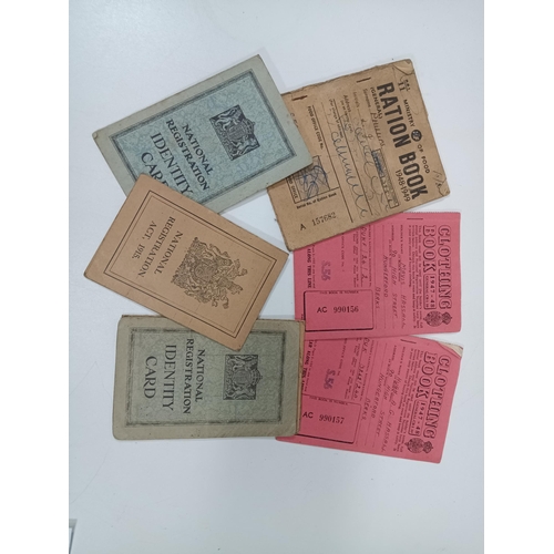 390 - A Collection of Post WW2 ration books, identity cards etc