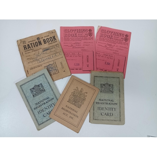 390 - A Collection of Post WW2 ration books, identity cards etc