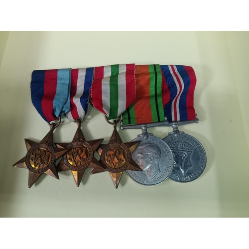 385 - A WWII Medal Group with Additional Ribbons - Defence Medal, War Medal, Italy Star, 1939 - 1945 Star,... 