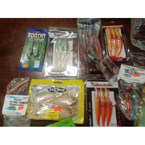 106 - Mixed Box Of Soft Fishing Lures, Many In Sealed Packets, Shads, Sand eels & Many More.