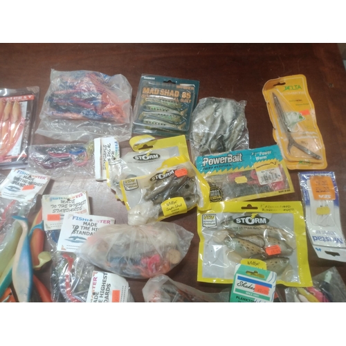 106 - Mixed Box Of Soft Fishing Lures, Many In Sealed Packets, Shads, Sand eels & Many More.