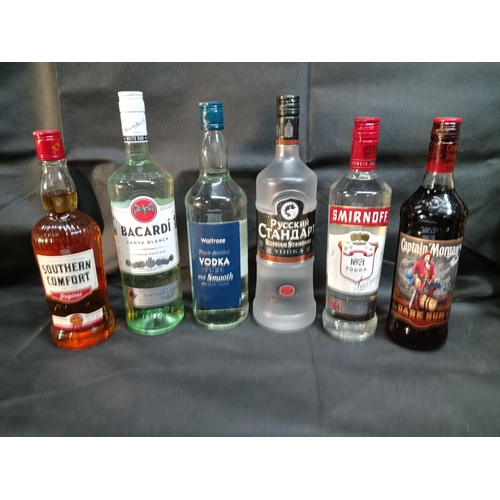 358 - 6 x Bottles of Assorted Spirits - Southern Comfort 70cl, Captain Morgan Dark Rum 70cl, Bacardi Rum 1... 