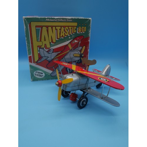 229A - A Fantastic & Co Tin Wind Up Toy Bi-Plane