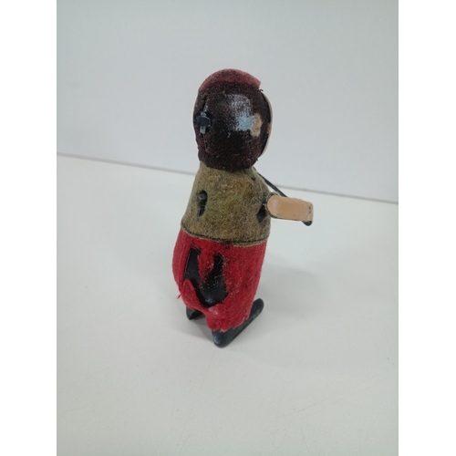 664 - A Vintage Schuco Clockwork Tin Toy Monkey playing a violin - Working