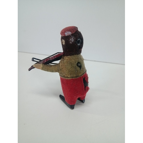 664 - A Vintage Schuco Clockwork Tin Toy Monkey playing a violin - Working