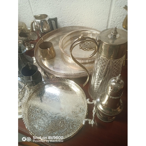 933 - Mixed Box Of Silver Plate & Pewter Trays, Candle Sticks Jugs, Coasters & More.