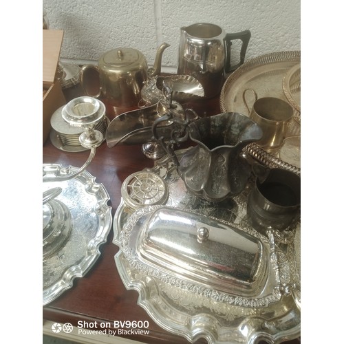 933 - Mixed Box Of Silver Plate & Pewter Trays, Candle Sticks Jugs, Coasters & More.