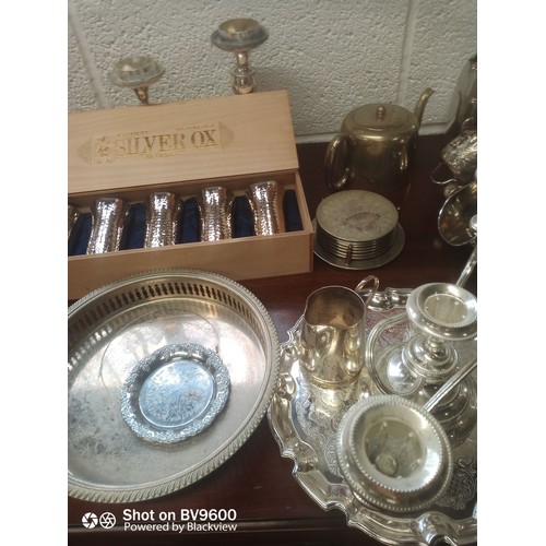 933 - Mixed Box Of Silver Plate & Pewter Trays, Candle Sticks Jugs, Coasters & More.