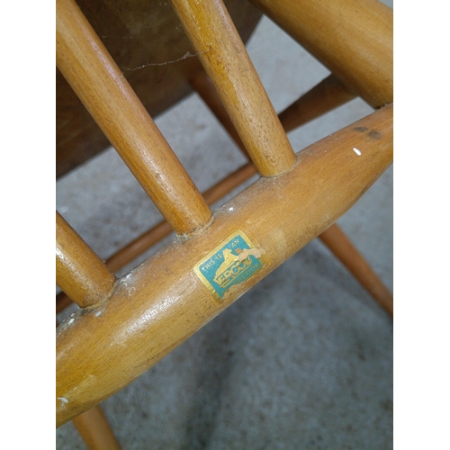 661 - An Ercol Stick Back Chair