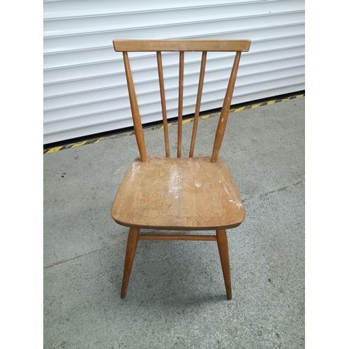 661 - An Ercol Stick Back Chair