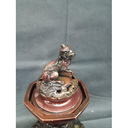 989 - A Bronze Kuro of Hexagonal Baluster with an Okimono of a Mythological Beast ( some losses) 36cm High