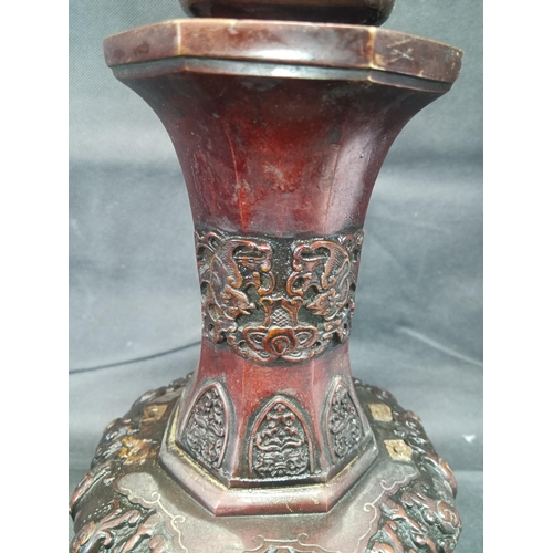 989 - A Bronze Kuro of Hexagonal Baluster with an Okimono of a Mythological Beast ( some losses) 36cm High