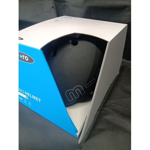 108B - A new Boxed and Unused Micro Helmet - Black 58 - 61cm - Scootering, Cycling, Skateboarding