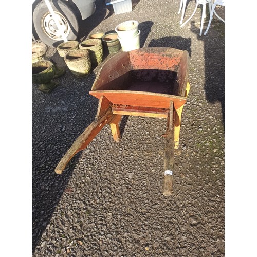 4 - Wooden Wheelbarrow Garden Planter - in need of a new coat of varnish - 63 x 150 x 68cm