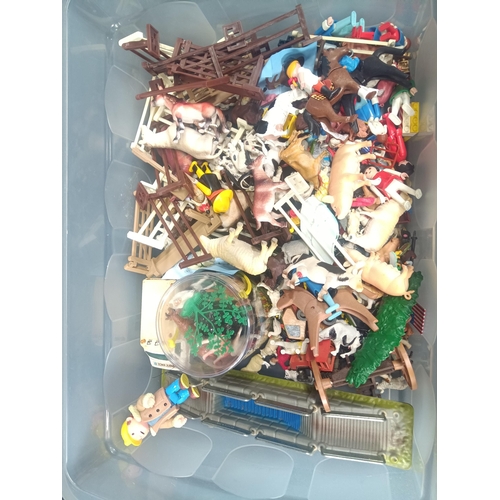 216B - A Large Box of Playmobil and Farm Animals