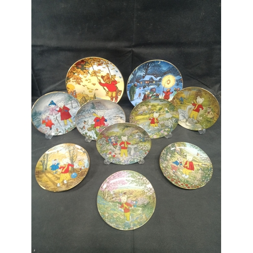 559 - A Hamilton Collection of 8 x Rupert the Bear Plates and 2 x Wedgewood Express Newspapers Plates