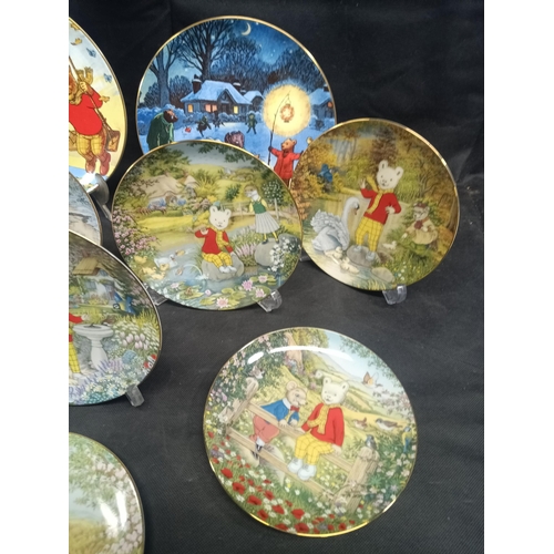 559 - A Hamilton Collection of 8 x Rupert the Bear Plates and 2 x Wedgewood Express Newspapers Plates