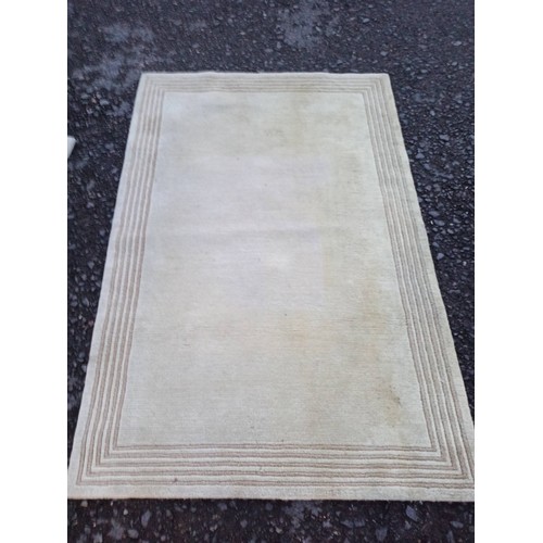 942 - Thick Wool Rug, With Beige Border.