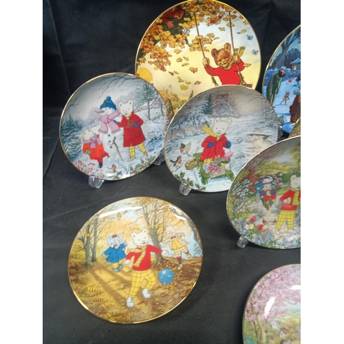 559 - A Hamilton Collection of 8 x Rupert the Bear Plates and 2 x Wedgewood Express Newspapers Plates